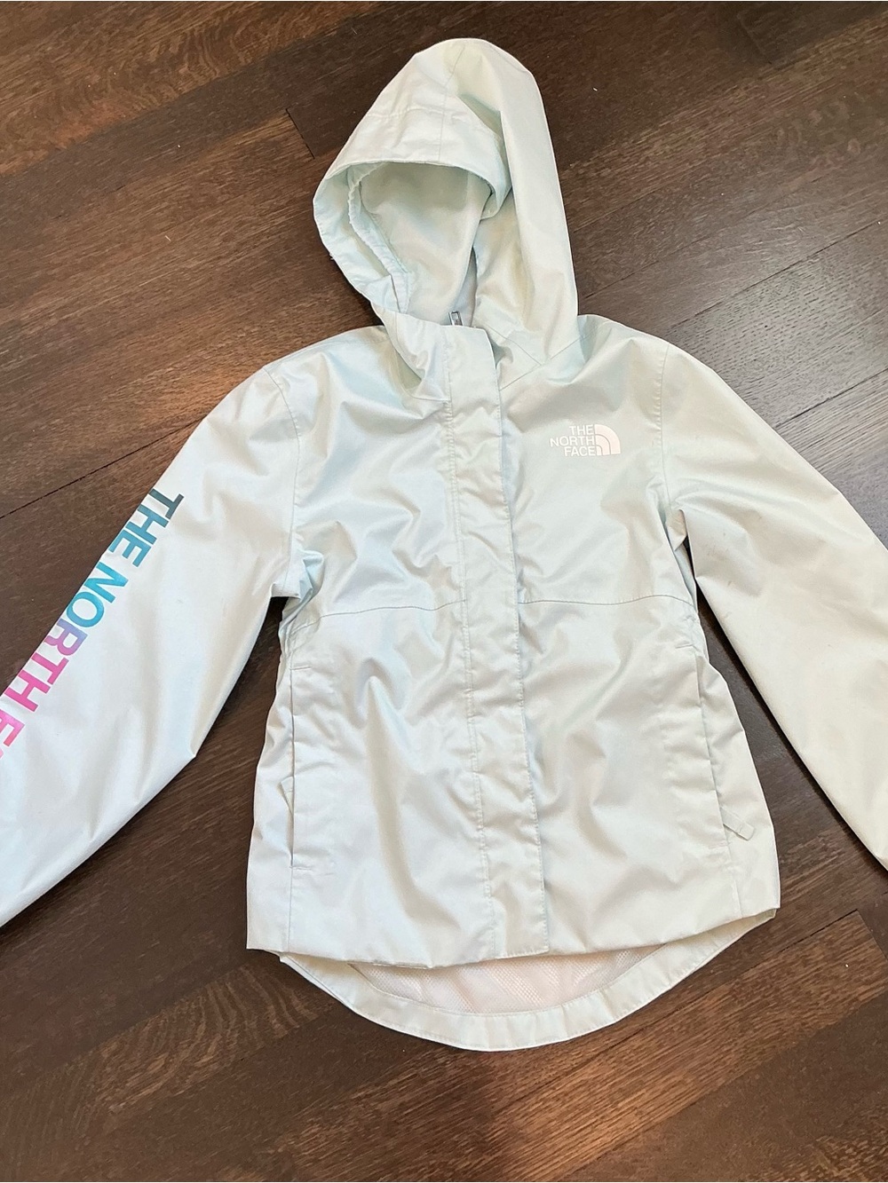 The North Face Pale Mint Hooded Rain Jacket with Gradient Sleeve Logo